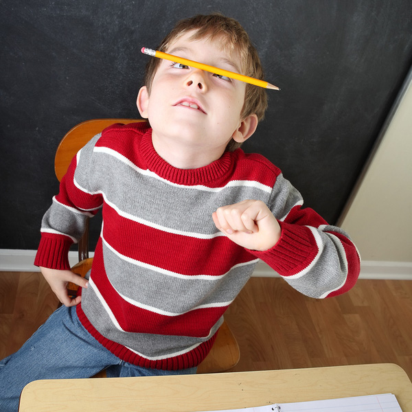 bigstock-bored-student-balancing-a-penc-16442606